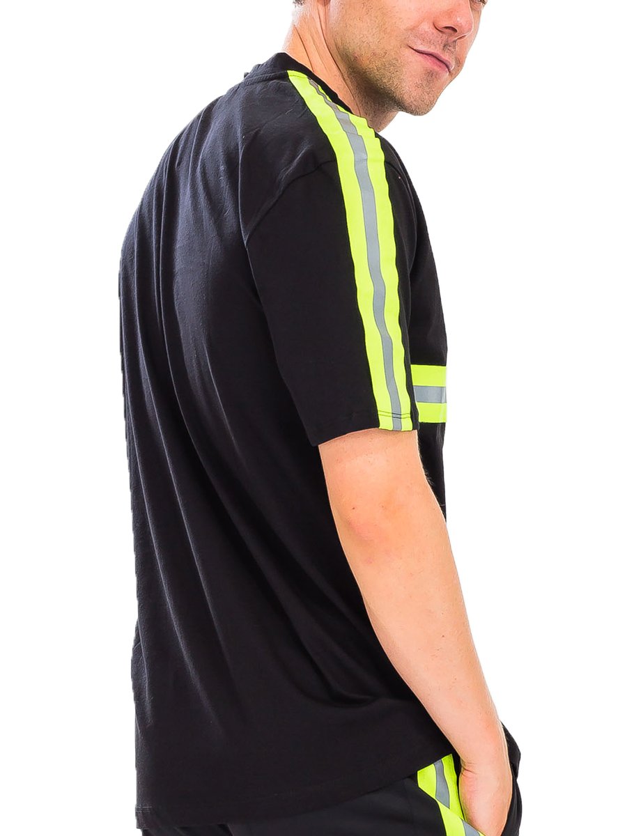 Element Reflective Tee showcasing reflective tape across chest and sleeves, made of 100% cotton, styled on a model.