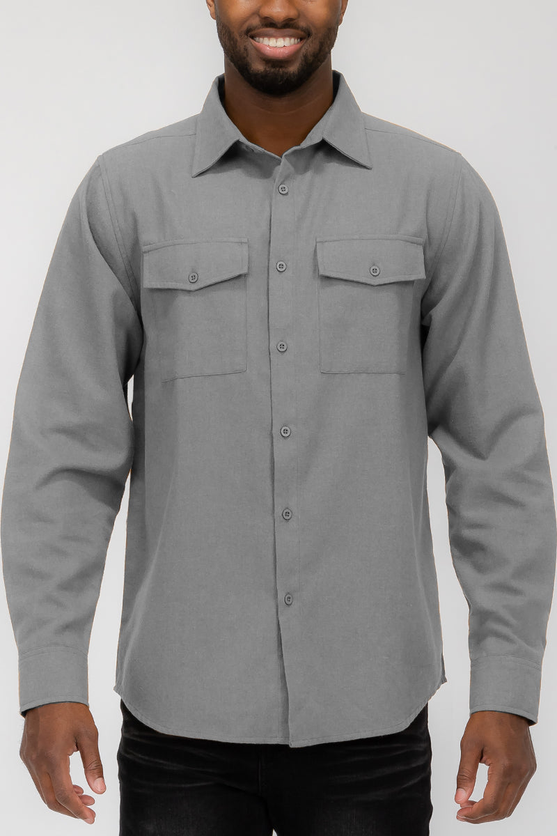 Flannel 2.1 long sleeve shirt in solid color with dual chest pockets and button flaps, showcasing a stylish and comfortable design.