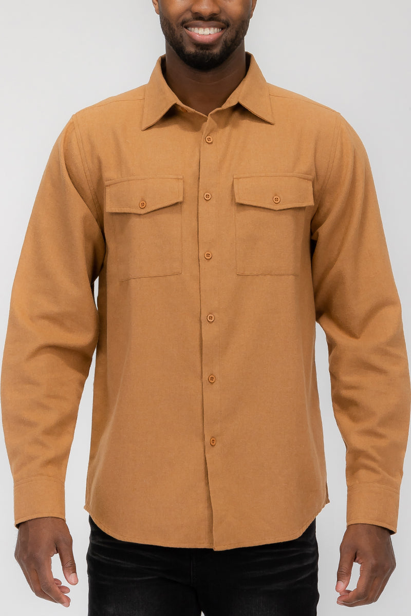 Flannel 2.1 long sleeve shirt in solid color with dual chest pockets and button flaps, showcasing a stylish and comfortable design.