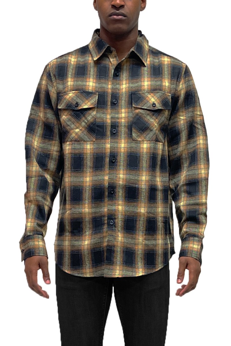 A cozy checkered flannel shirt with long sleeves, brushed on both sides for softness, displayed on a hanger.