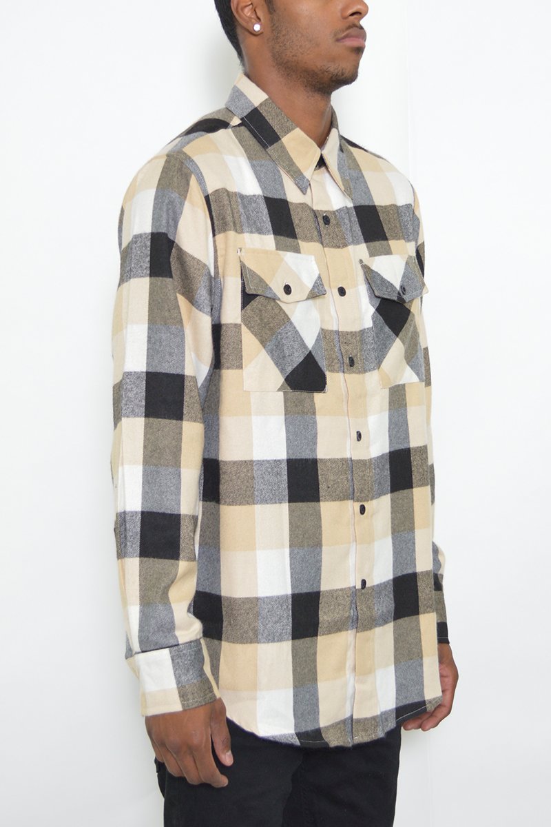 A stylish flannel shirt made from 100% polyester, showcasing a classic pattern and true-to-size fit, perfect for layering and casual wear.