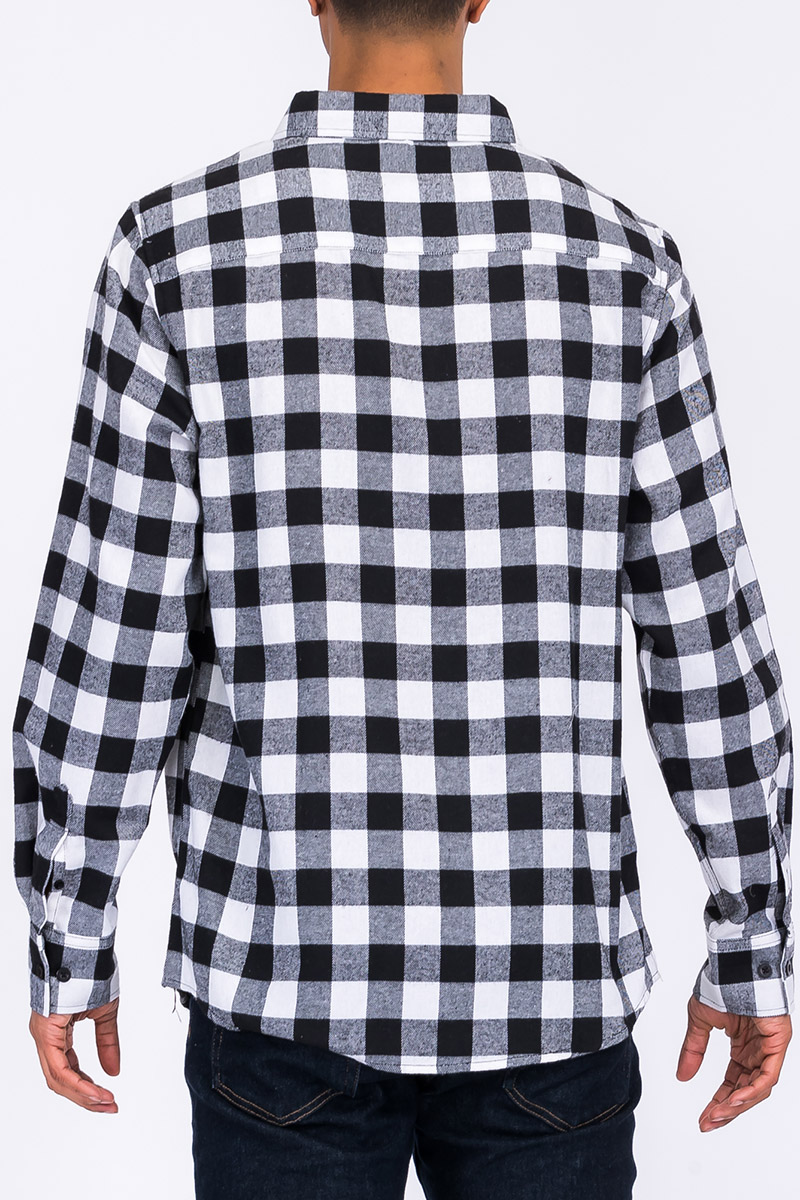 A cozy flannel shirt made from 100% polyester, showcasing its soft texture and true-to-size fit, perfect for chilly weather.