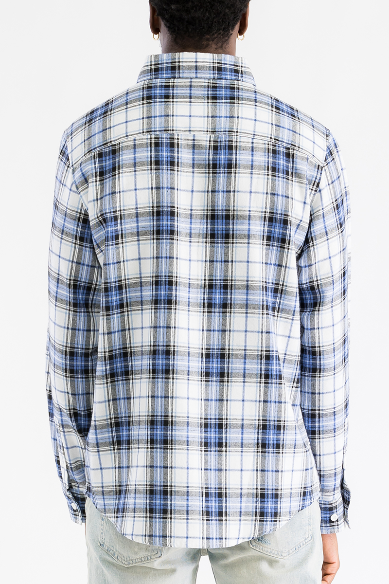 A cozy checkered flannel shirt with long sleeves, brushed on both sides for a soft and fluffy feel, perfect for casual wear.