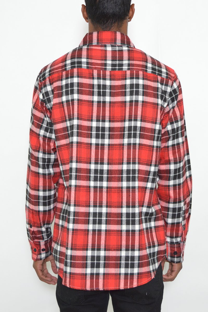 A stylish flannel shirt made from 100% polyester, showcasing its soft texture and true-to-size fit, perfect for layering.