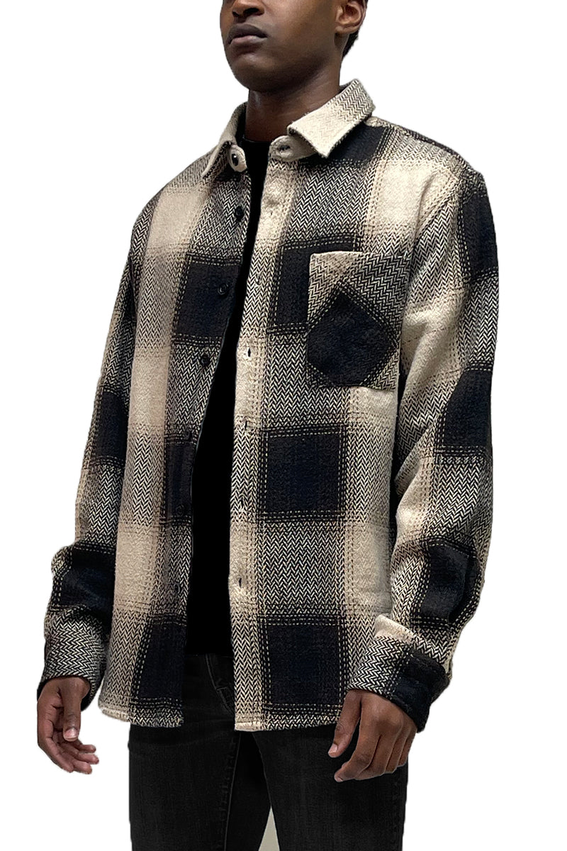 A stylish Flannel Combo Shacket featuring a chest pocket and button closure, perfect for layering in any season.