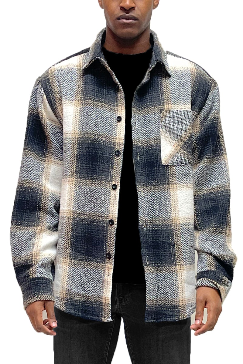 A stylish Flannel Combo Shacket featuring a chest pocket and button closure, perfect for layering in any season.