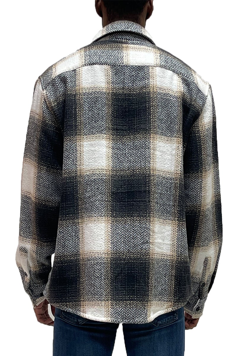 A stylish Flannel Combo Shacket featuring a chest pocket and button closure, perfect for layering in any season.