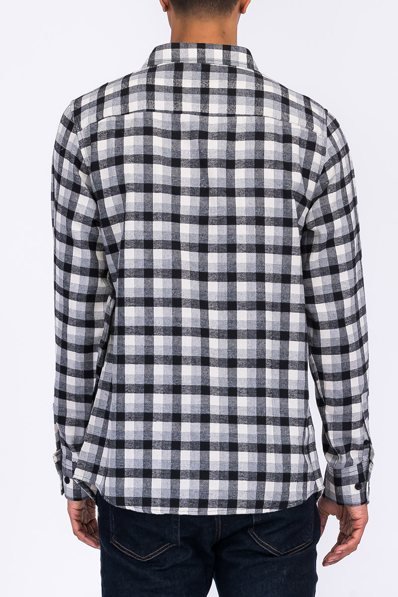 A stylish flannel shirt made from 100% polyester, showcasing its soft texture and true-to-size fit, perfect for casual wear.