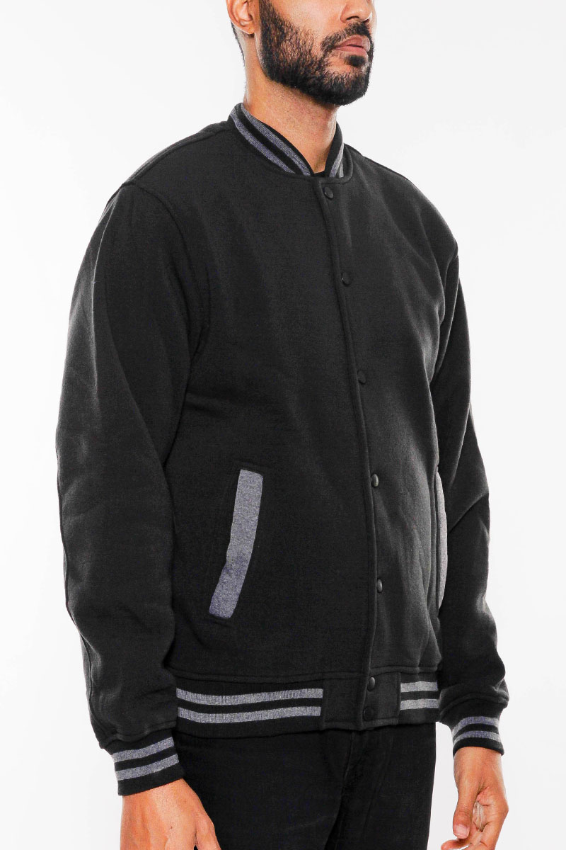 A stylish fleece varsity jacket featuring a snap button closure, ribbed collar, cuffs, and waist, perfect for casual wear.