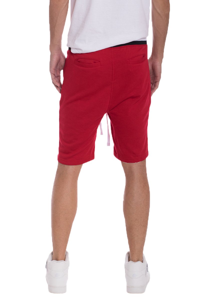 A pair of stylish French Terry Shorts featuring an elastic waist and drawstring, perfect for casual wear.