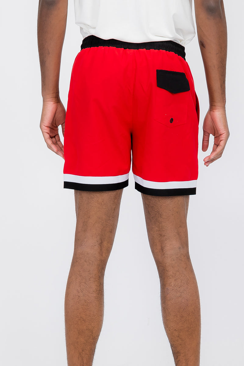 Fronted Cali Rep Print Swim Shorts featuring a vibrant design, mesh lining, and pockets for convenience.