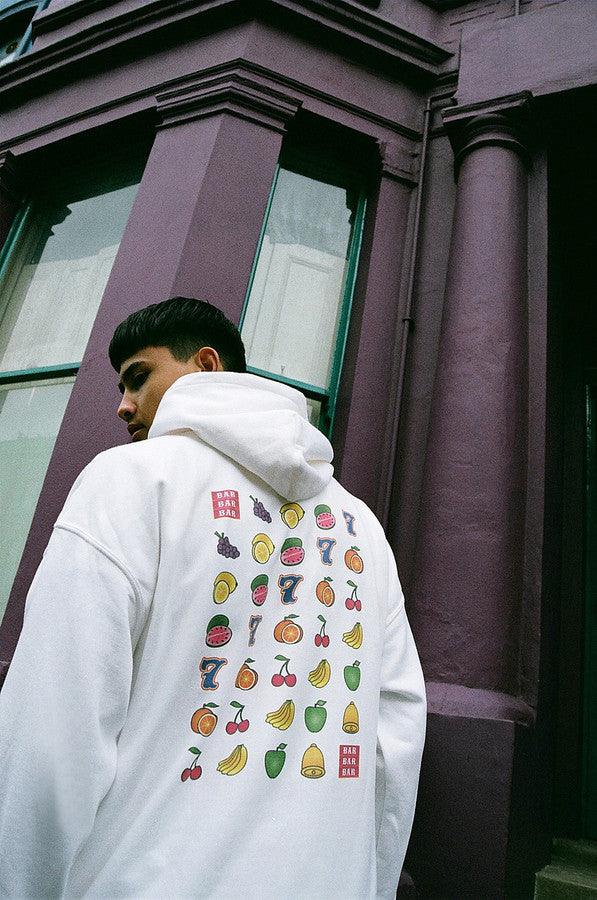 Fruity Casino Slots Design Hoodie featuring vibrant graphics on a white background, showcasing a playful casino theme.