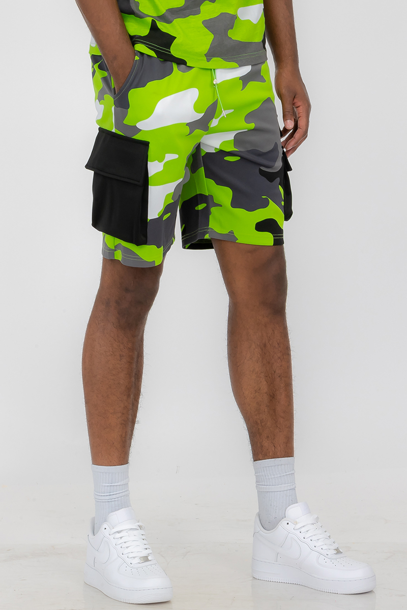 Full Camo Toggle Shorts featuring a digital print, elastic waist, drawstring, and cargo pocket with toggle.