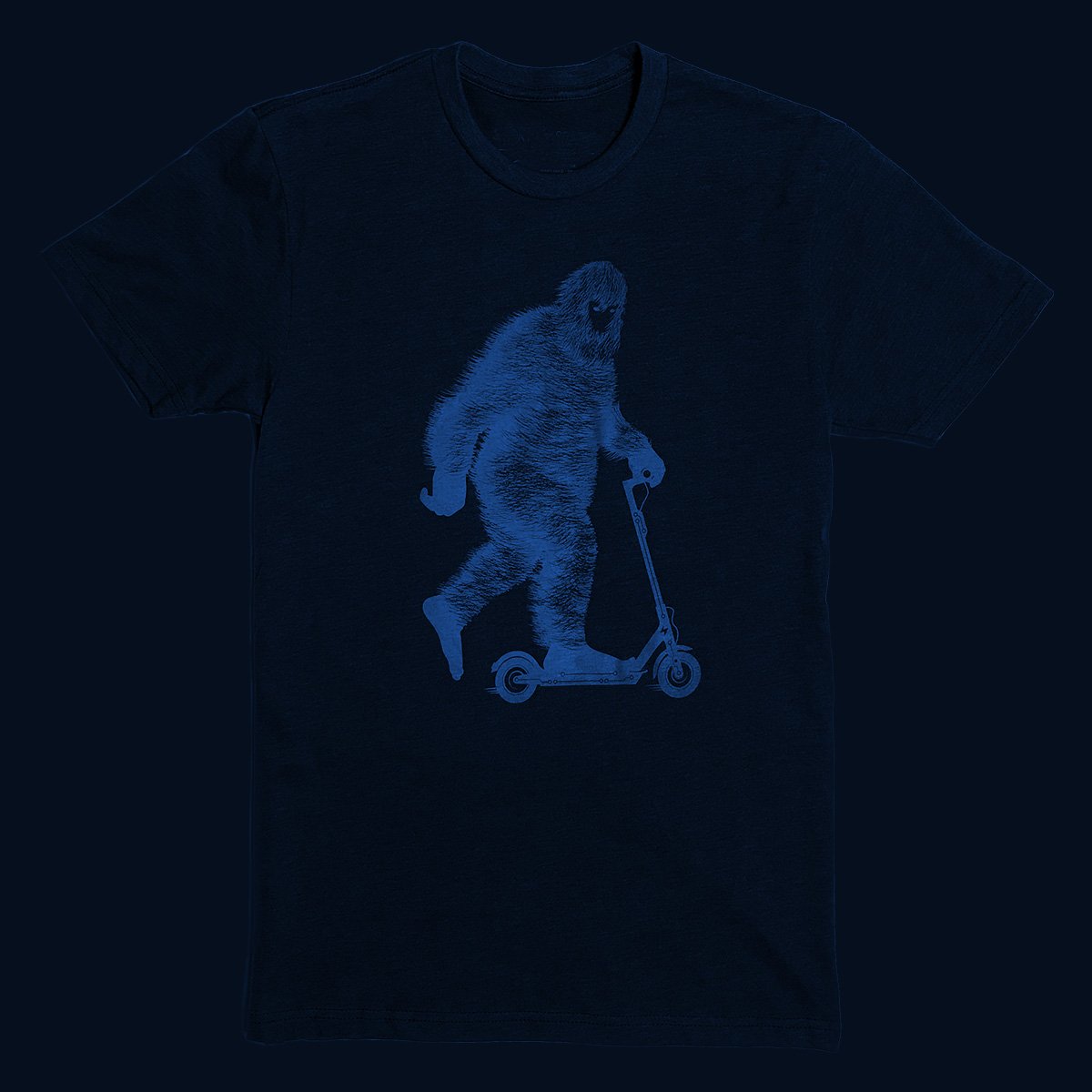 Glow BIG T-shirt in smoke grey, glowing electric blue in the dark, showcasing its unique design and soft fabric.