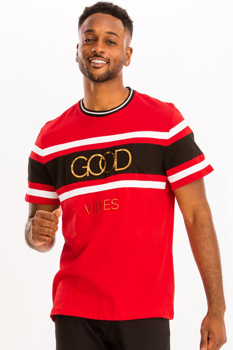 A stylish GOOD VIBES TEE made from 100% cotton, displayed on a mannequin, showcasing its relaxed fit and vibrant design.