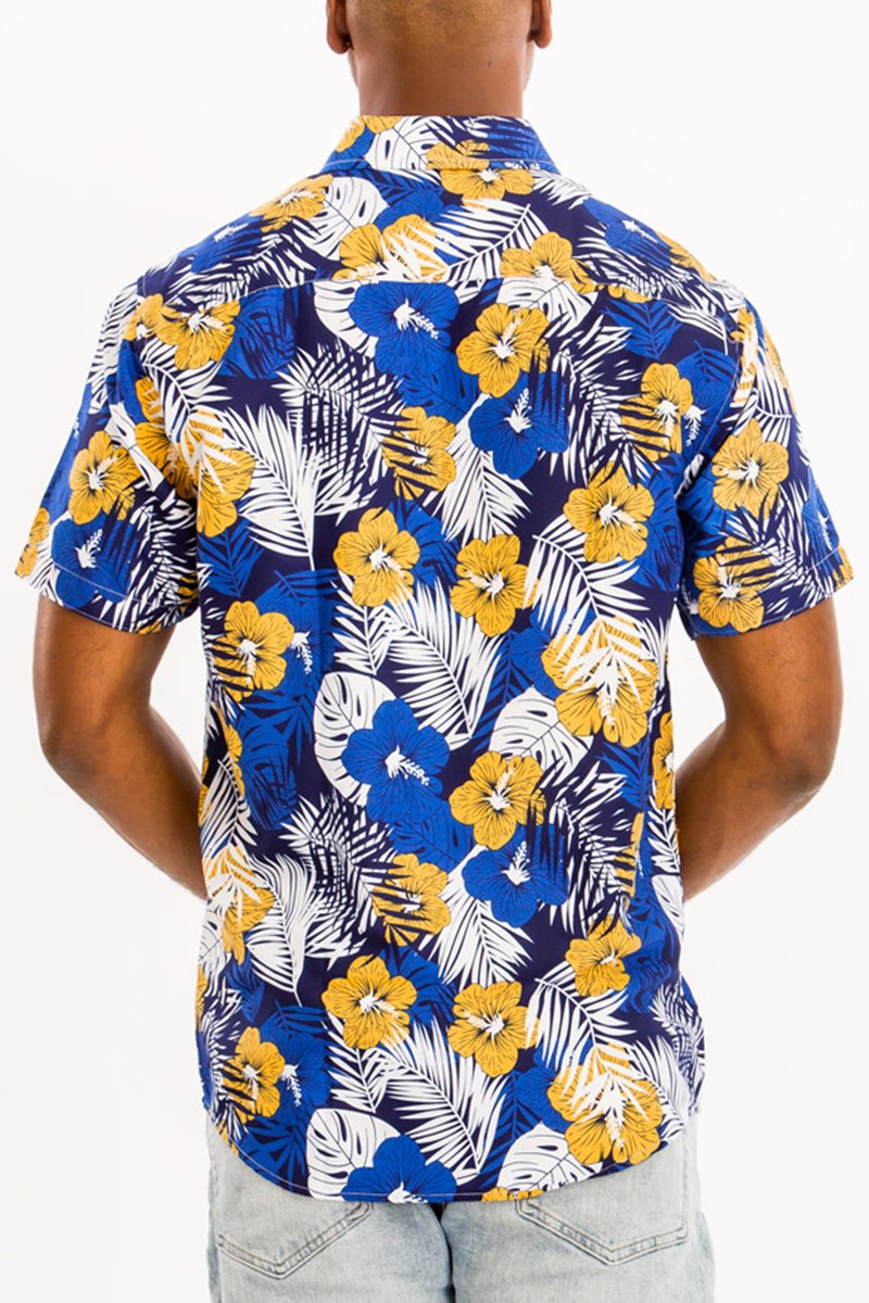 A vibrant Hawaiian button down shirt featuring a unique digital all-over print, showcasing a chest pocket and a regular fit.