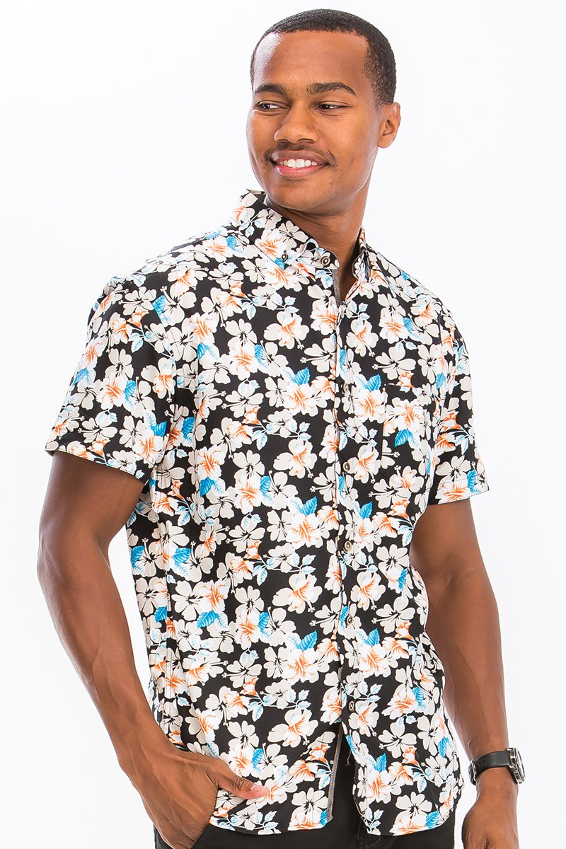 A vibrant Hawaiian Button Down shirt featuring tropical patterns, button closure, and a chest pocket, perfect for summer wear.