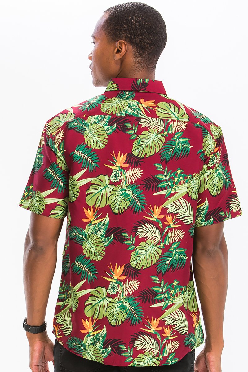 A vibrant Hawaiian button down shirt featuring a unique digital print, showcasing a chest pocket and regular fit.