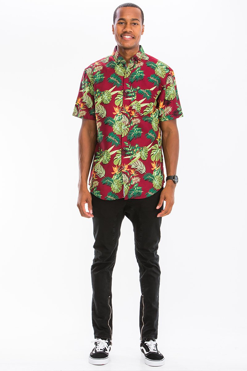 A vibrant Hawaiian button down shirt featuring a unique digital print, showcasing a chest pocket and regular fit.