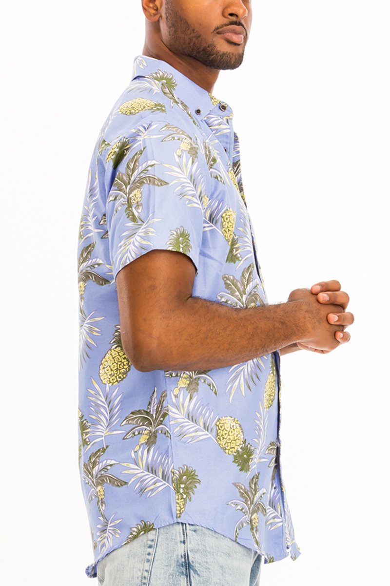 A vibrant Hawaiian button down shirt featuring a unique digital all-over print, showcasing a chest pocket and a regular fit.