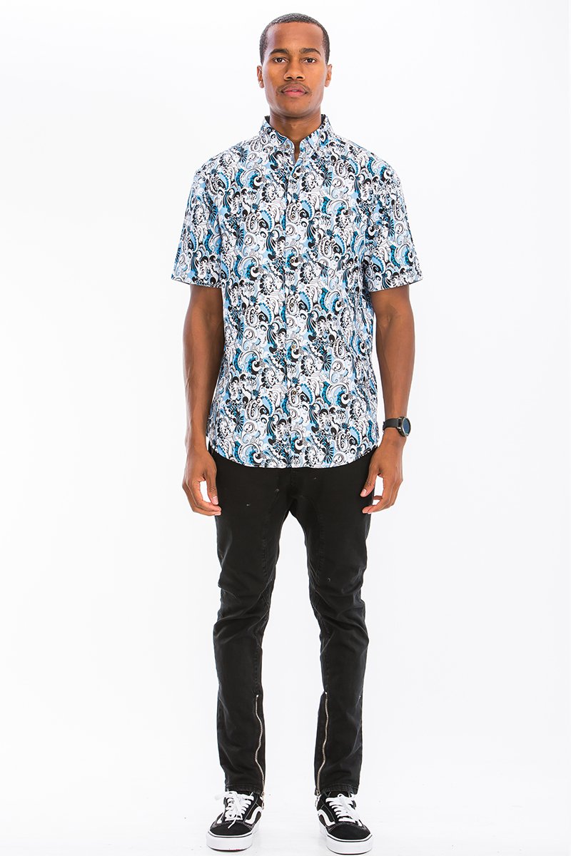 A vibrant Hawaiian button down shirt featuring unique digital prints, showcasing a chest pocket and a regular fit, perfect for summer wear.