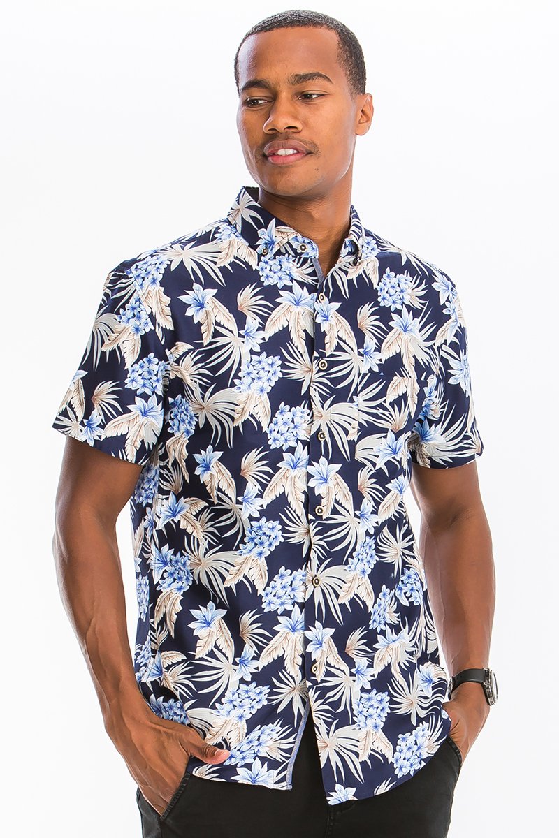 A vibrant Hawaiian button down shirt featuring a unique digital print, chest pocket, and regular fit, perfect for summer outings.