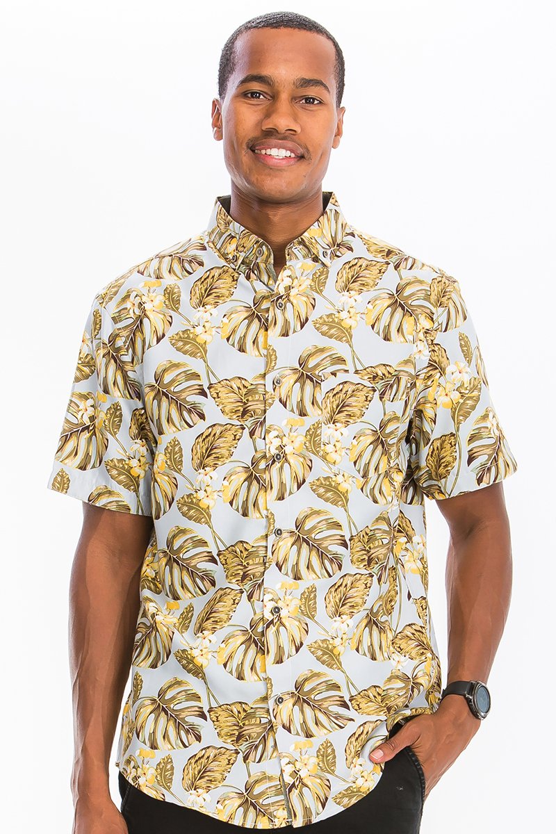 A vibrant Hawaiian button down shirt featuring unique digital prints, showcasing a chest pocket and a regular fit, perfect for summer wear.