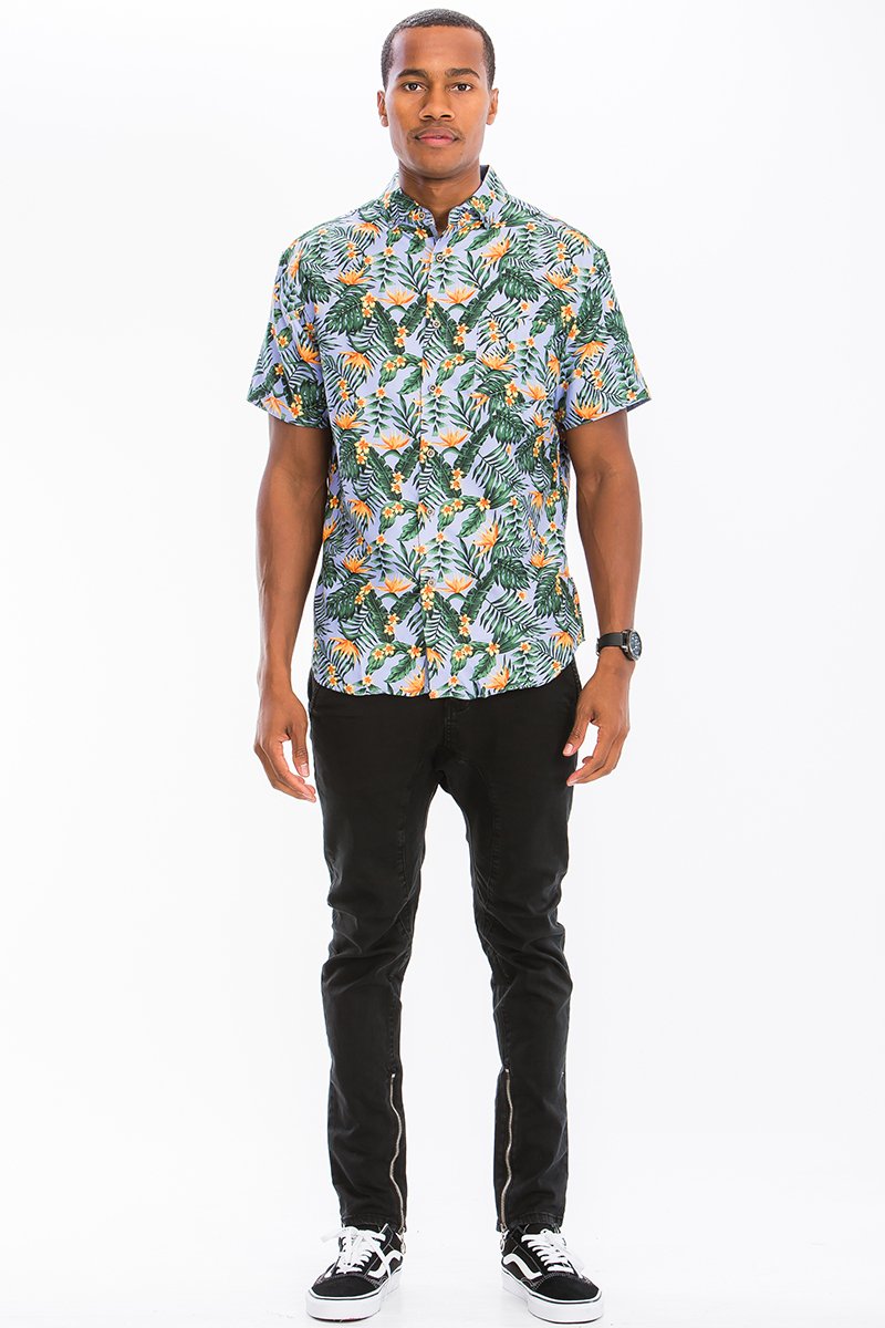 A vibrant Hawaiian Print Button Down Shirt featuring unique digital patterns, a chest pocket, and a regular fit, perfect for casual wear.