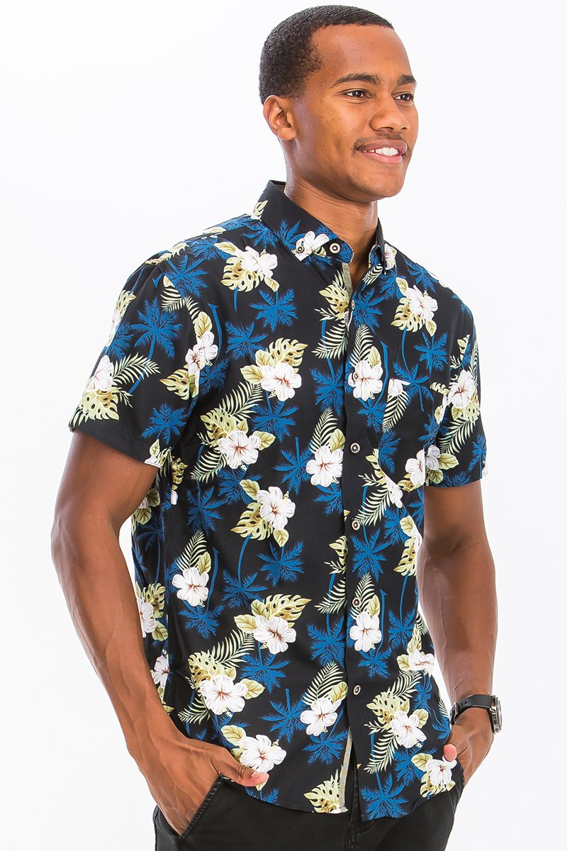 A vibrant Hawaiian Print Button Down Shirt featuring unique digital patterns, a chest pocket, and a regular fit, perfect for summer outings.