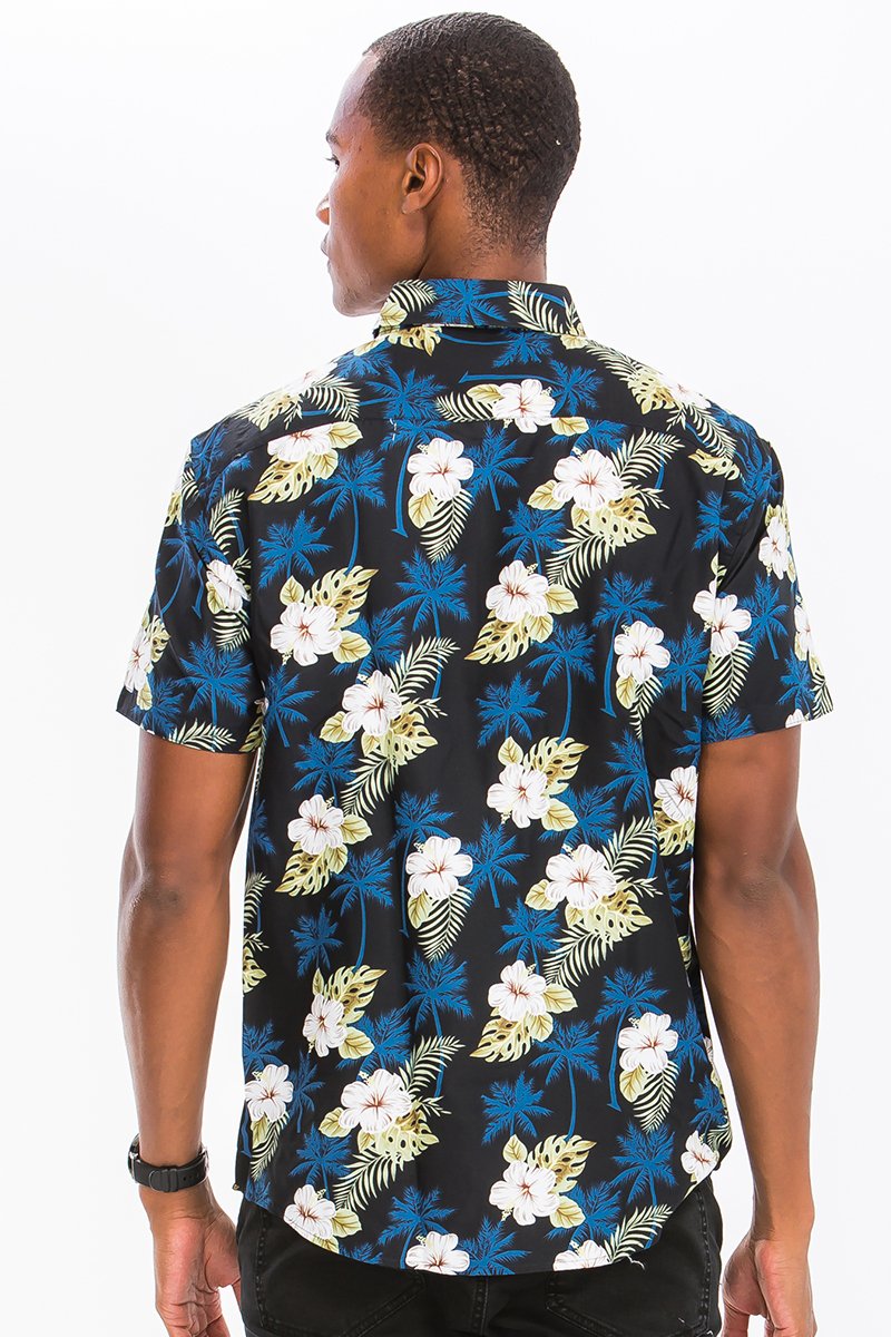 A vibrant Hawaiian Print Button Down Shirt featuring unique digital patterns, a chest pocket, and a regular fit, perfect for summer outings.