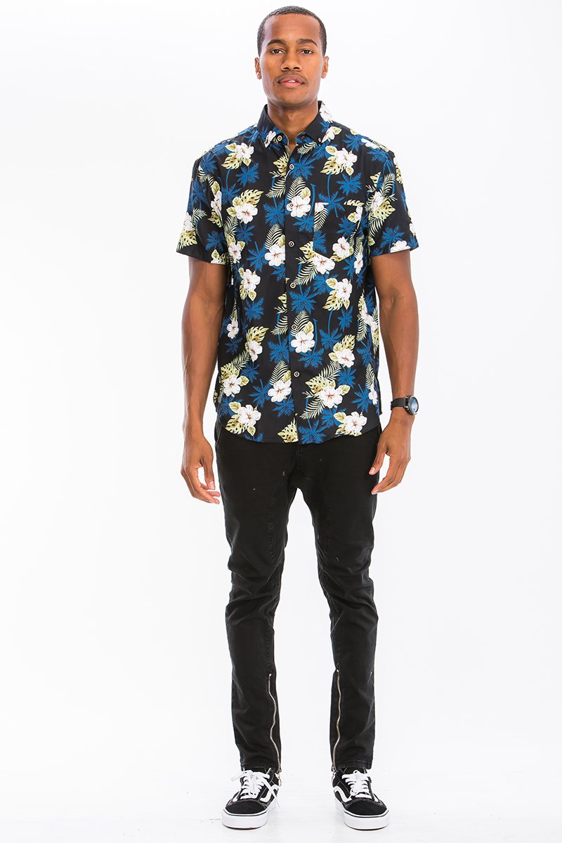 A vibrant Hawaiian Print Button Down Shirt featuring unique digital patterns, a chest pocket, and a regular fit, perfect for summer outings.