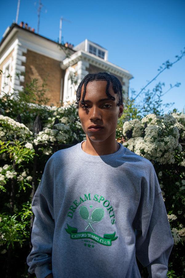 Heather Grey Sweatshirt featuring Catford Tennis Club embroidery, showcasing a relaxed fit and stylish design.