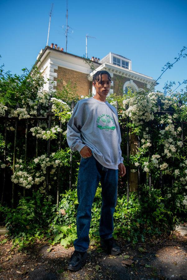 Heather Grey Sweatshirt featuring Catford Tennis Club embroidery, showcasing a relaxed fit and stylish design.