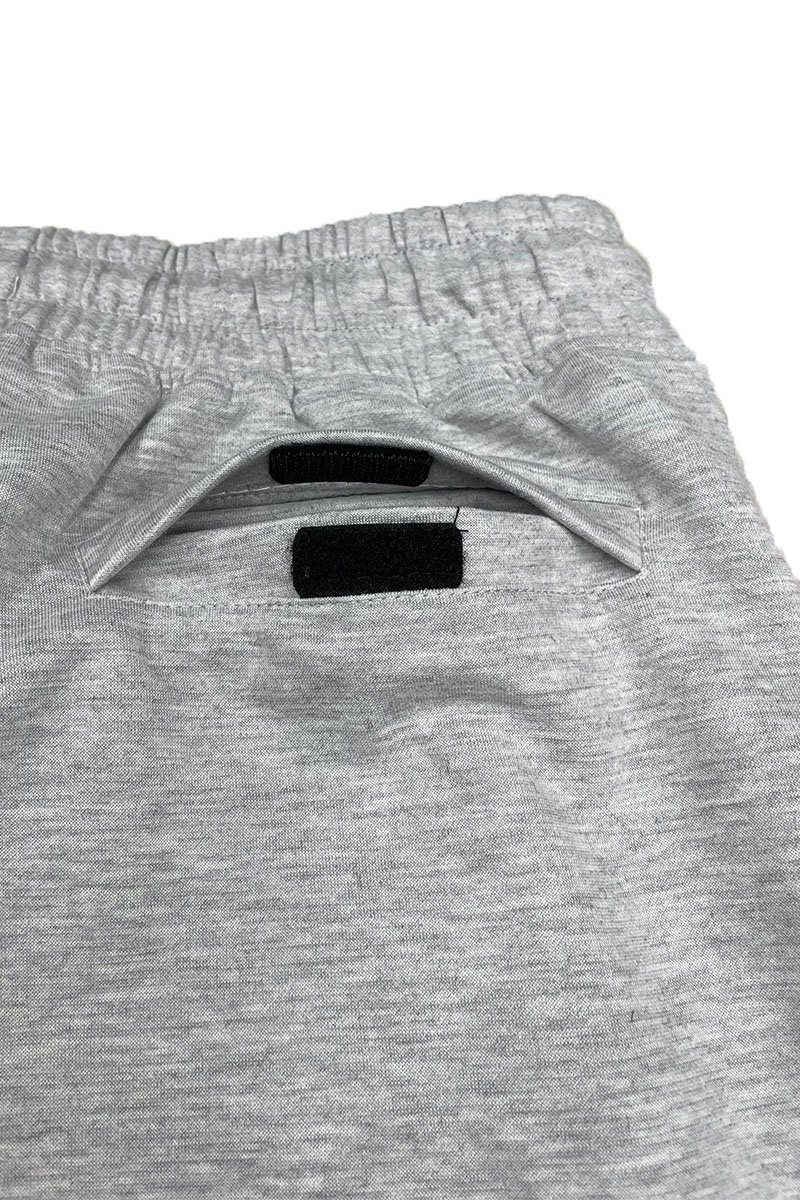 Heathered cotton shorts featuring an elastic waist and zipper pocket, perfect for casual wear.