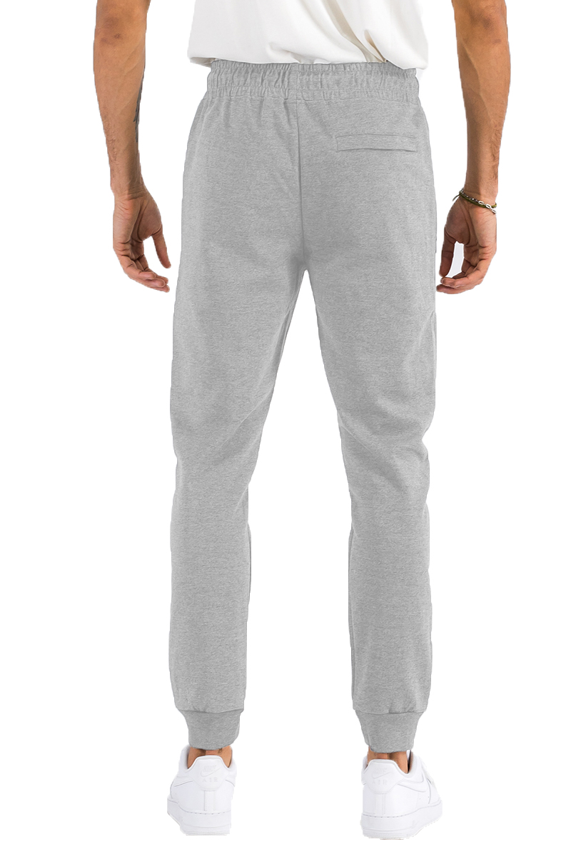 Heathered cotton sweats featuring zippered pockets and elastic waist with drawstring, perfect for casual wear.