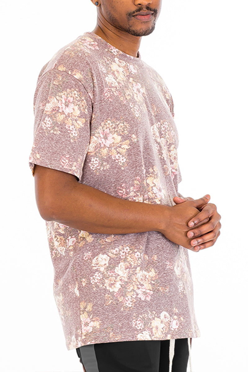 Heathered Floral Tee featuring a vibrant floral print, made from a soft polyester-spandex blend, displayed on a model.