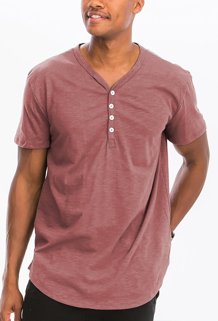 A stylish Henley Scallop Tee made from soft cotton, featuring a four-button closure and scalloped edges, perfect for casual wear.