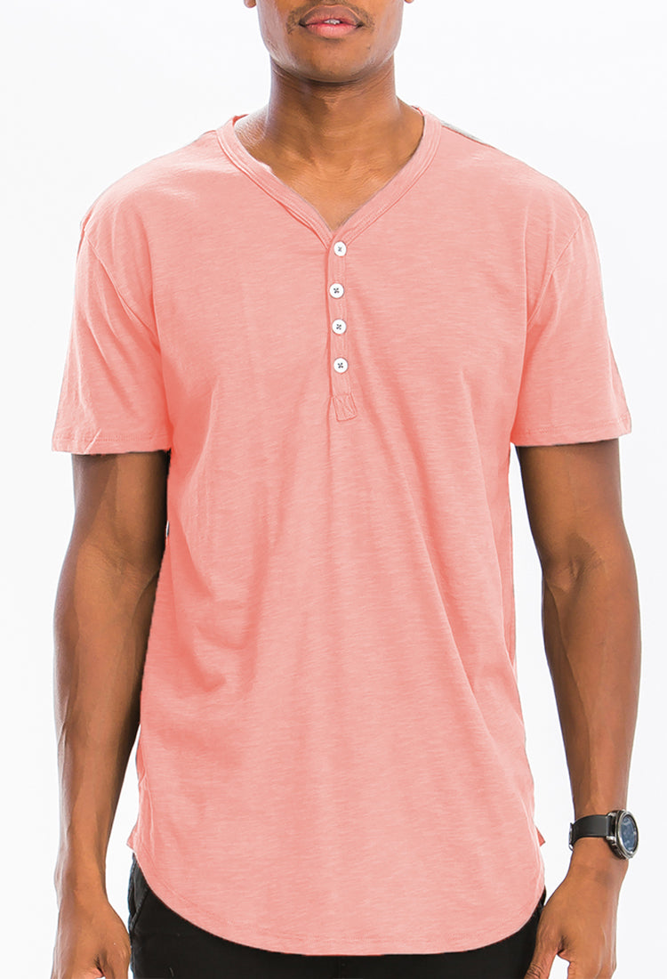 A stylish Henley Scallop Tee made from soft cotton, featuring a four-button closure and scalloped edges, perfect for casual wear.