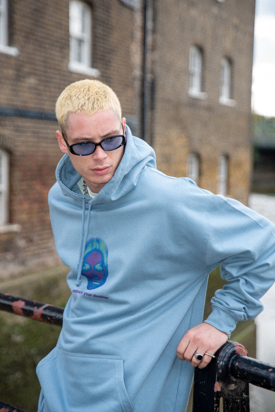 Dusty blue unisex hoodie featuring 'Embrace Your Destiny' print, showcasing a relaxed fit and heavyweight cotton material.