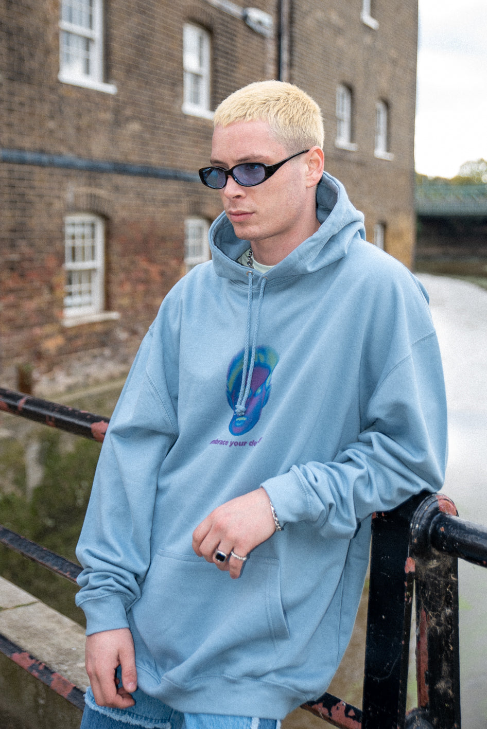 Dusty blue unisex hoodie featuring 'Embrace Your Destiny' print, showcasing a relaxed fit and heavyweight cotton material.