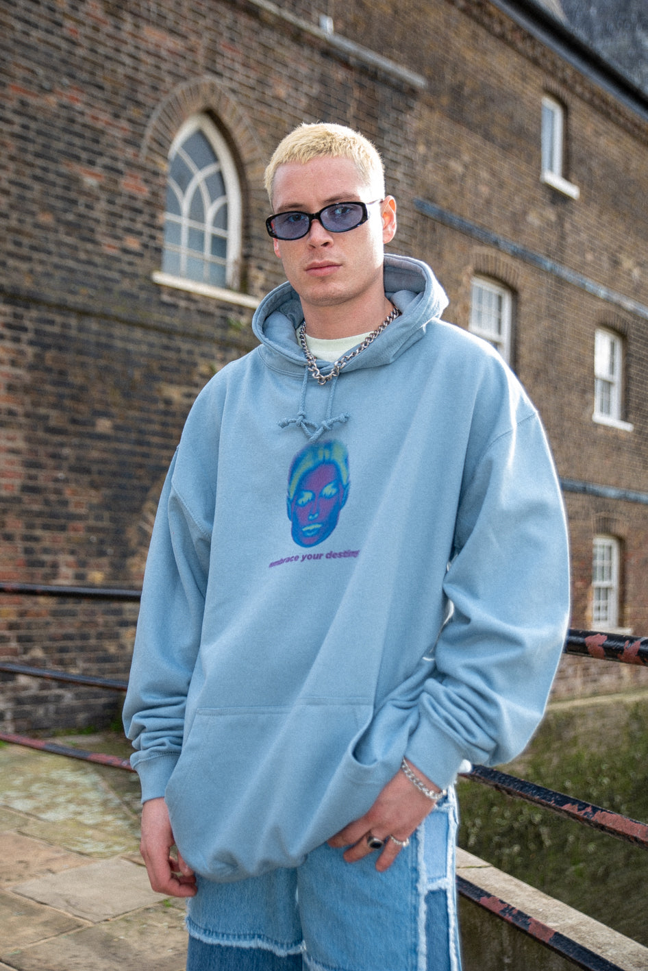 Dusty blue unisex hoodie featuring 'Embrace Your Destiny' print, showcasing a relaxed fit and heavyweight cotton material.