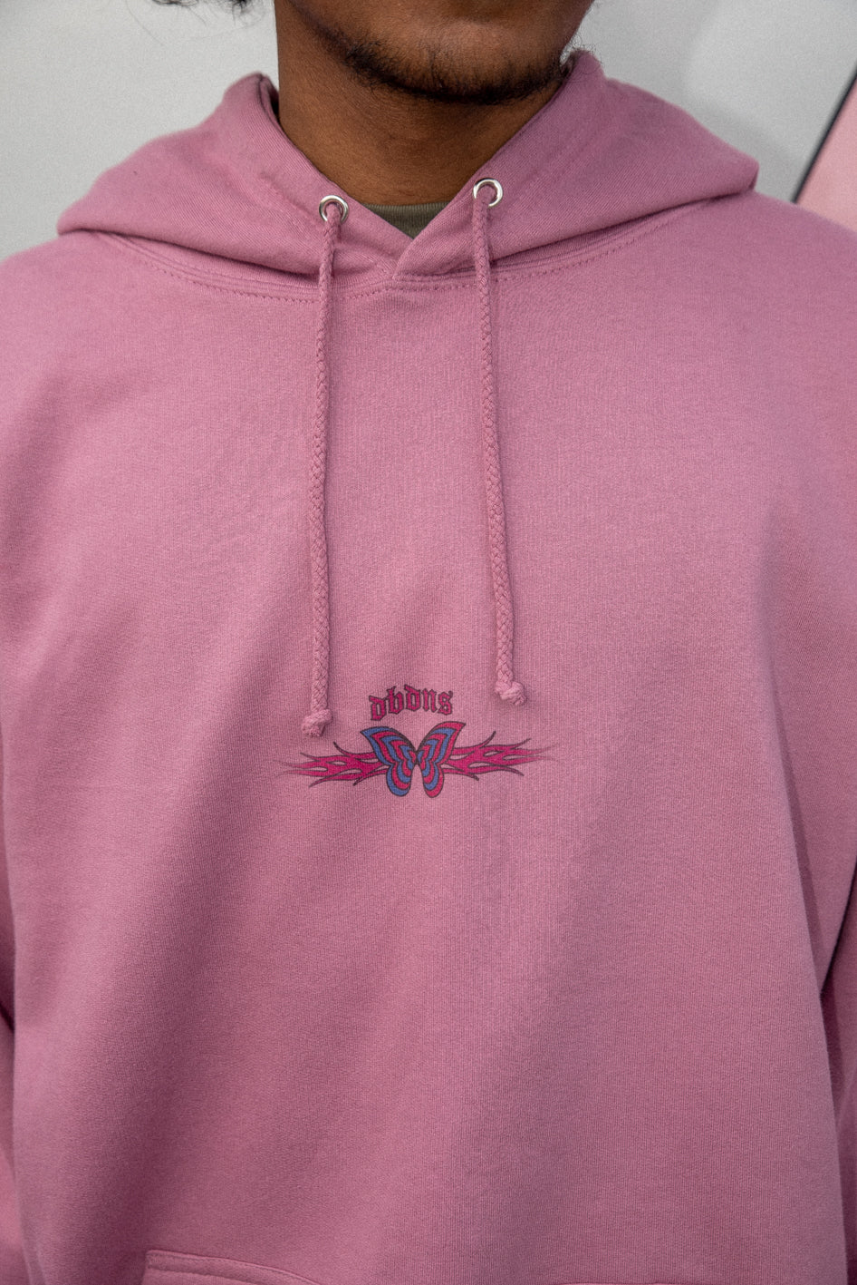 Dusty purple unisex hoodie with vibrant Y2K butterfly and flame print, showcasing a relaxed fit and heavyweight cotton material.