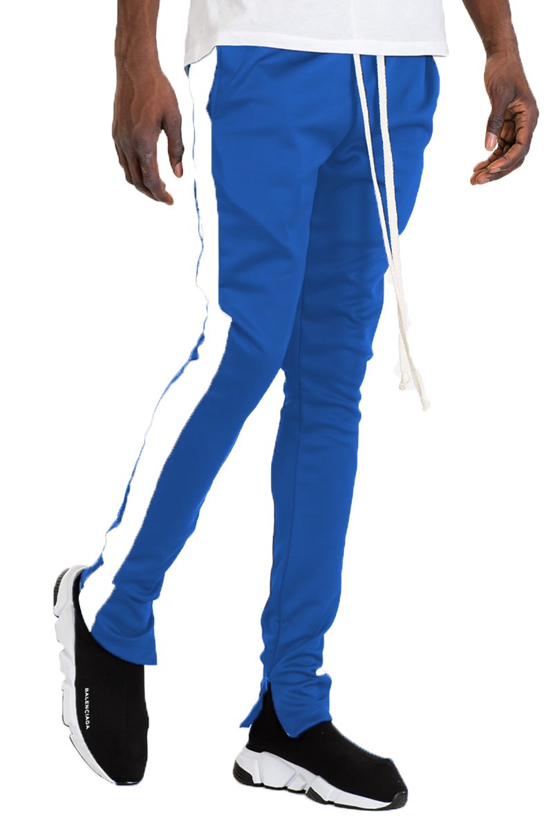 Holiday Track Pants in Royal and White, featuring a skinny fit, standard pockets, and a hidden ankle zipper.