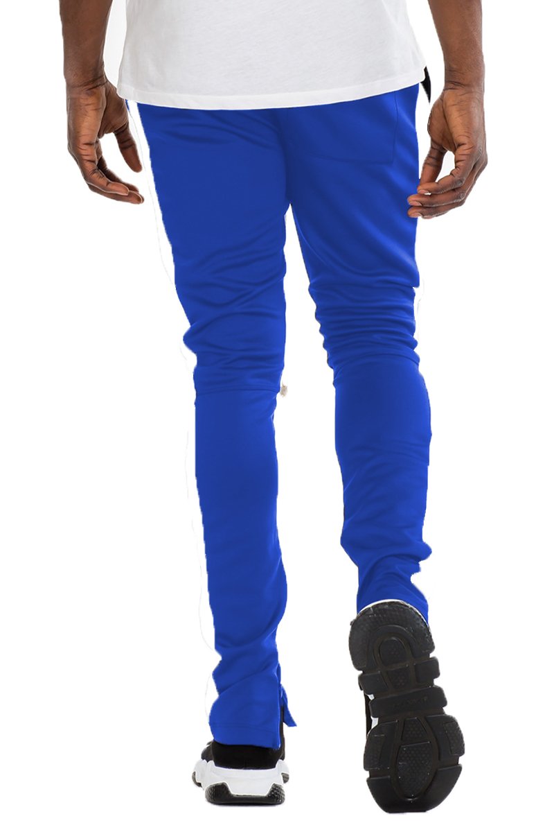 Holiday Track Pants in Royal and White, featuring a skinny fit, standard pockets, and a hidden ankle zipper.