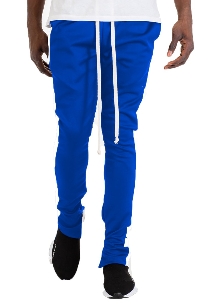 Holiday Track Pants in Royal and White, featuring a skinny fit, standard pockets, and a hidden ankle zipper.