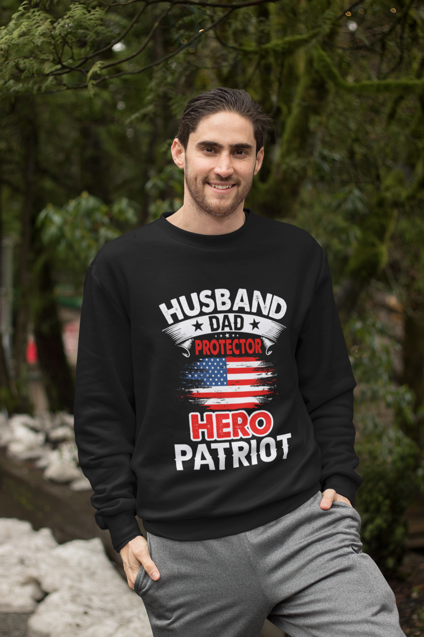 Husband, Dad, Protector, Hero, Patriot Crewneck Sweatshirt displayed on a hanger, showcasing its soft fabric and trendy design.