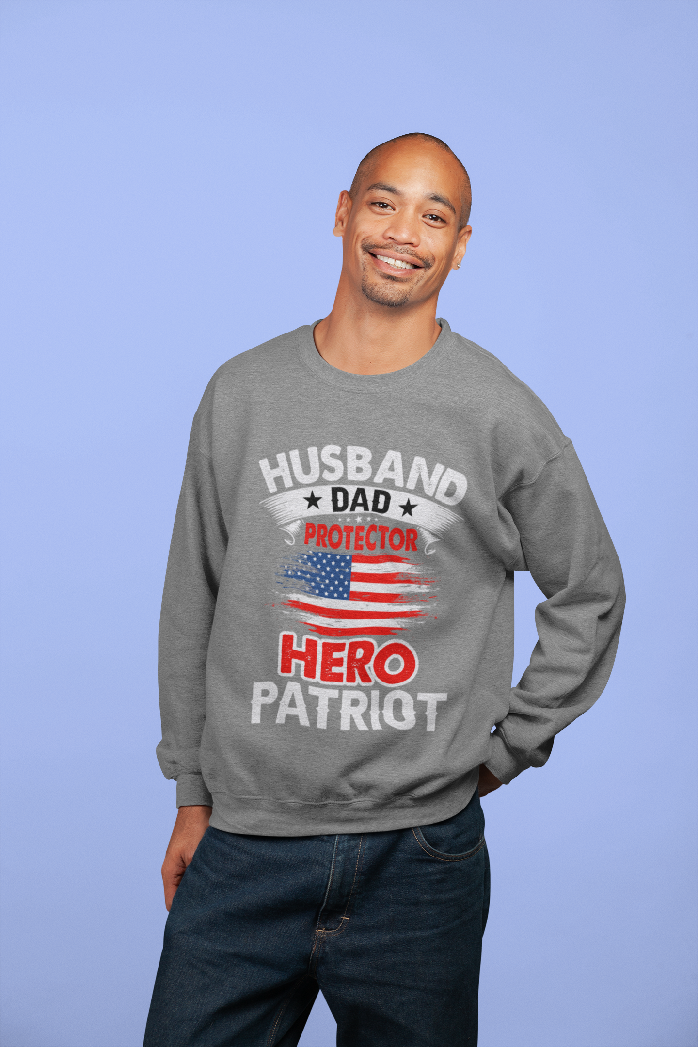 Husband, Dad, Protector, Hero, Patriot Crewneck Sweatshirt displayed on a hanger, showcasing its soft fabric and trendy design.