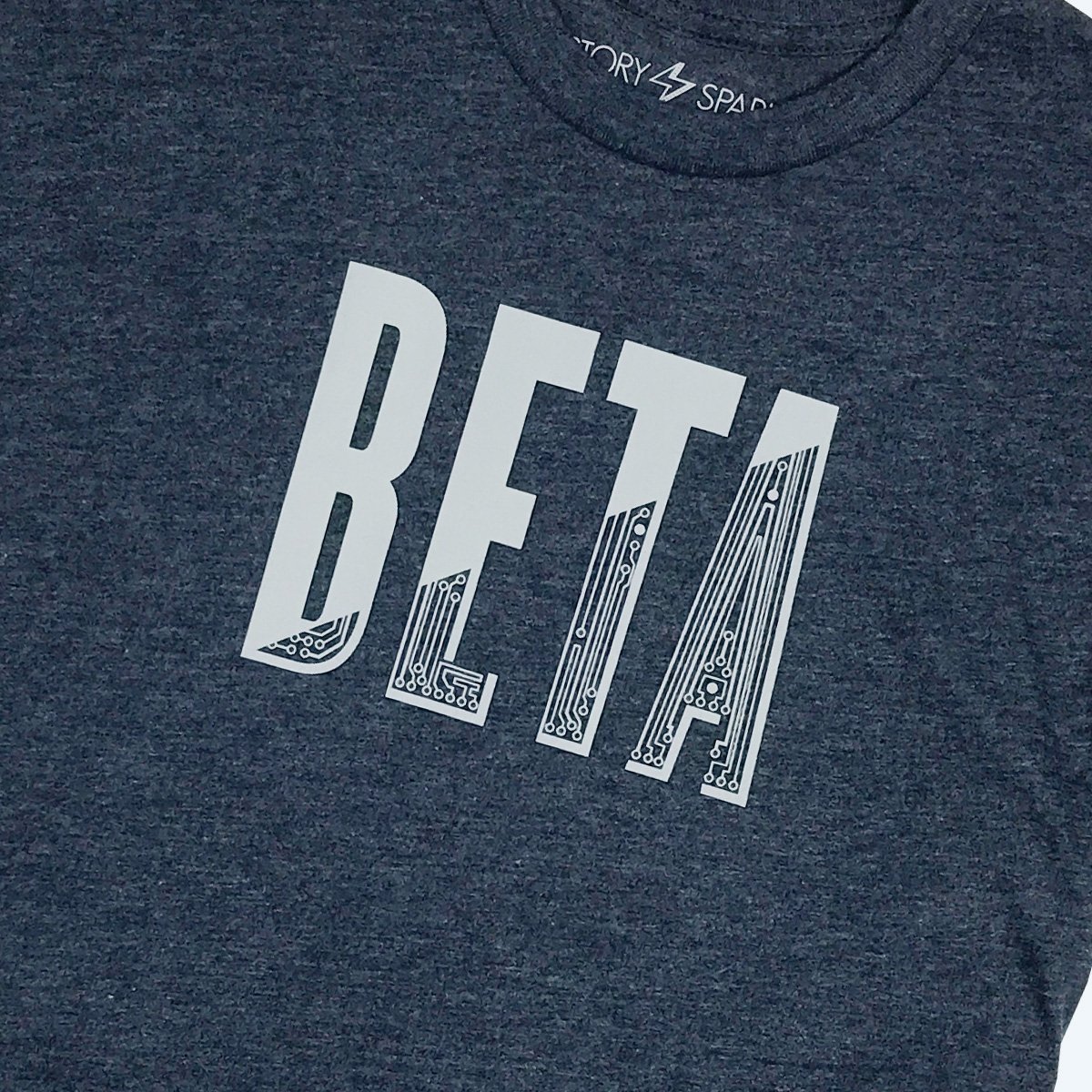 In Beta T-Shirt in dark heather navy featuring a launch rocket sleeve print, made from soft ring-spun cotton.