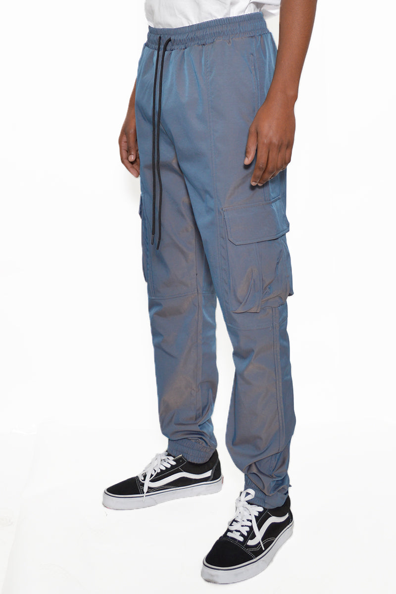 Iridescent Cargo Jogger showcasing shimmering fabric, elastic waist, and cargo pockets.