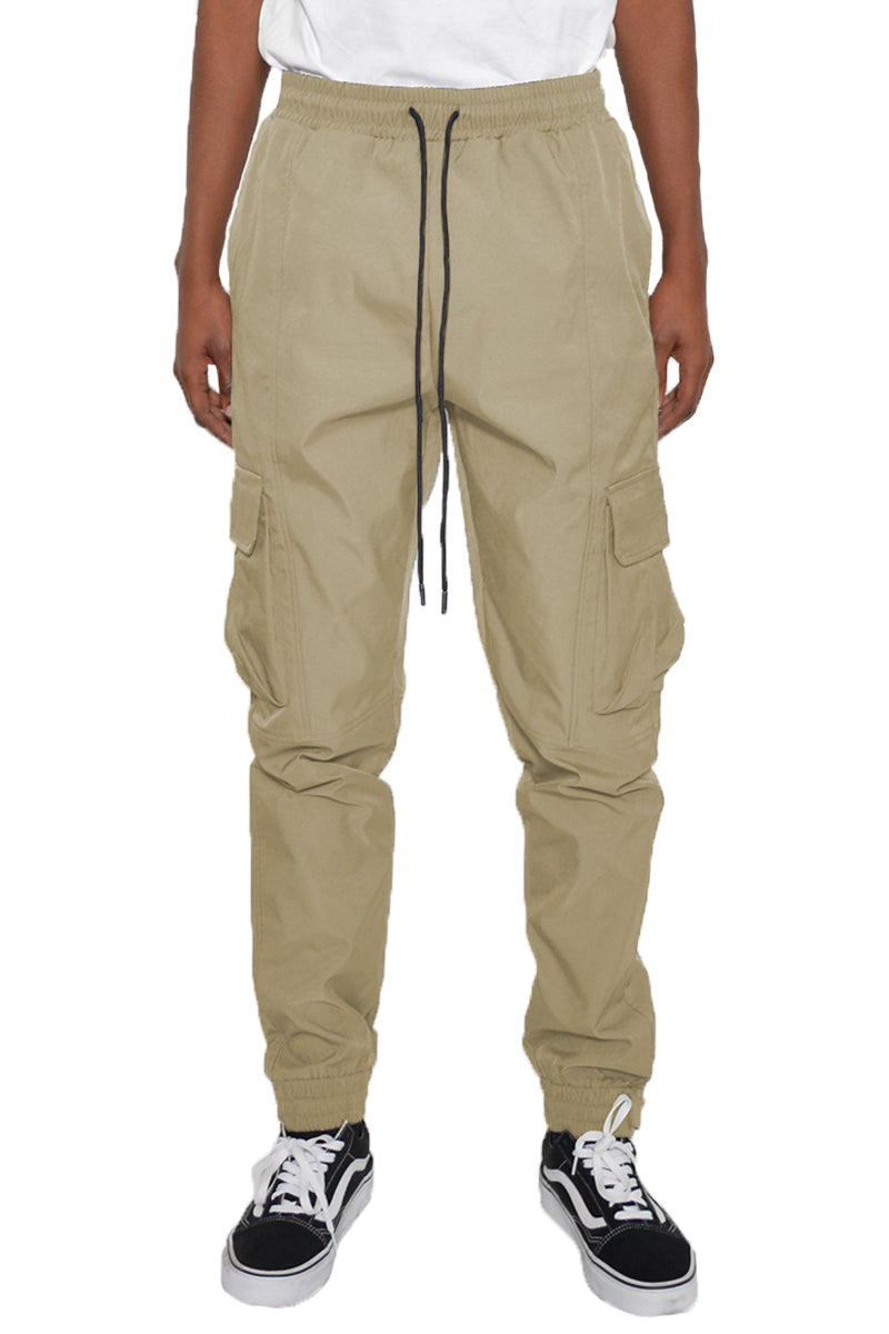 Iridescent Cargo Jogger showcasing shimmering fabric, elastic waist, and cargo pockets.